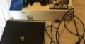 Playstation 4 downloaded playstation 4 with 6 games & 2 controllers & hdmi AC/AV cables