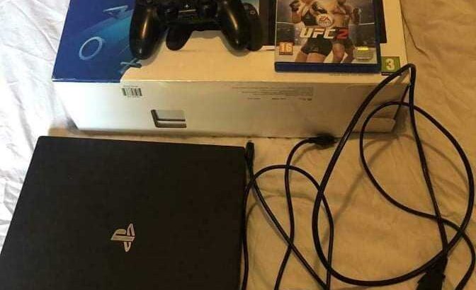 Playstation 4 downloaded playstation 4 with 6 games & 2 controllers & hdmi AC/AV cables