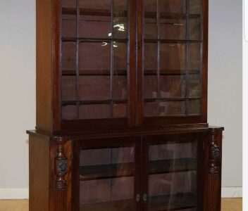 VICTORIAN MAHOGANY BOOKCASE WITH LION MASK, CLAW FEET AND GLASS DOORS