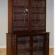 VICTORIAN MAHOGANY BOOKCASE WITH LION MASK, CLAW FEET AND GLASS DOORS