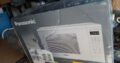 Panasonic 1.3 Cu. Ft. 1100W Genius Sensor Countertop Microwave Oven  in White