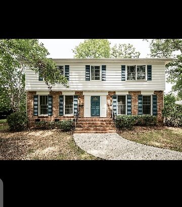 This traditional brick home in Charlotte is a beauty!