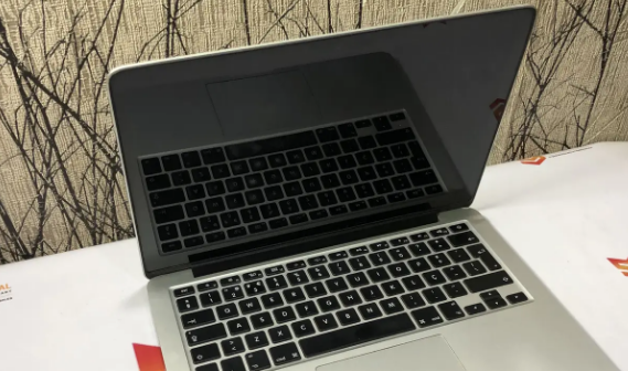 neat mac book 2 month used