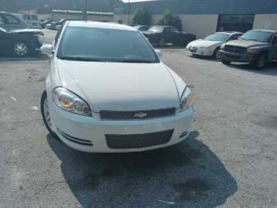 Very clean 2016 chevy Impala, white 4 dr. ,A/C low